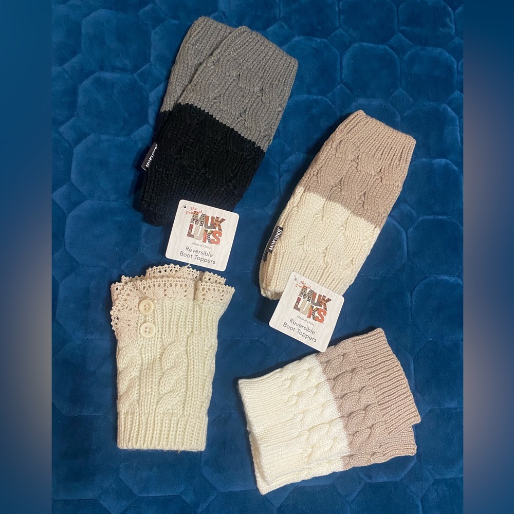 4 pairs of boot toppers. Knit. 2 pairs are Muk luk brand. 2 pairs are unknown.